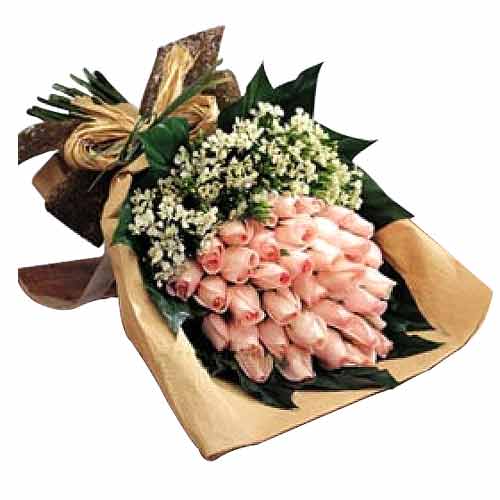 Two dozen choice of pink/peach/red/yellow roses in......  to flowers_delivery_tacloban_philippine.asp