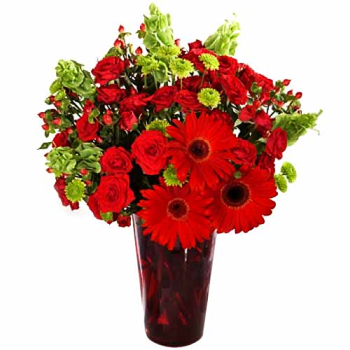 Fresh Mixed Red Flowers in a Vase.<br>- Red Roses<......  to San Carlos