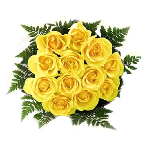 One dozen yellow roses in a bouquet.......  to La Carlota