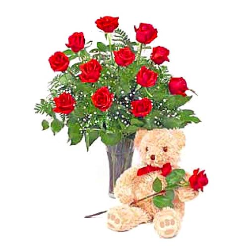 1 dozen red roses in a vase with bear......  to ormoc