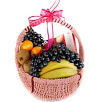 This basket includes Oranges, bananas, grapes, a b......  to cherkessk_florists.asp
