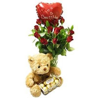  red roses in a glass vase with a cute teddy, a bo......  to Pretoria