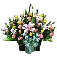A traditional basket of Pink Lilies, Pink & Yellow......  to Daejeon_southkorea.asp
