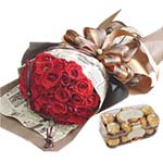 Comprising of A Basket of 50 Red Roses and a Pack ......  to jeju do