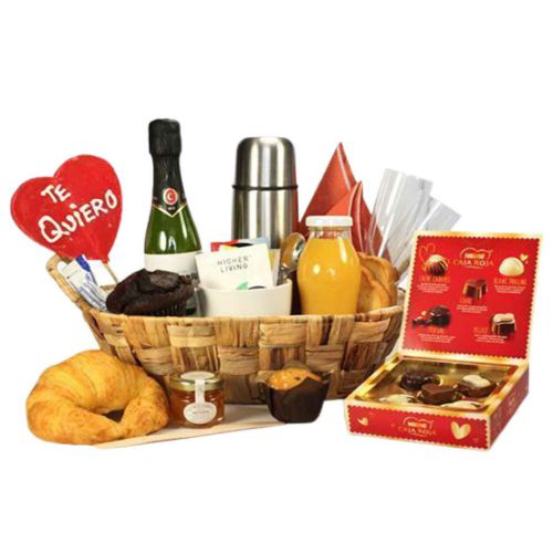A basket filled with breakfast treats, with coffee......  to San sebastian_spain.asp