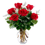 Surprise your loved one by sending these red roses in vase and make her smile th...