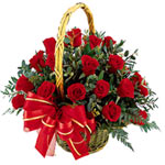 This beautifully arranged basket filled with cherry red roses is sure to be the ...