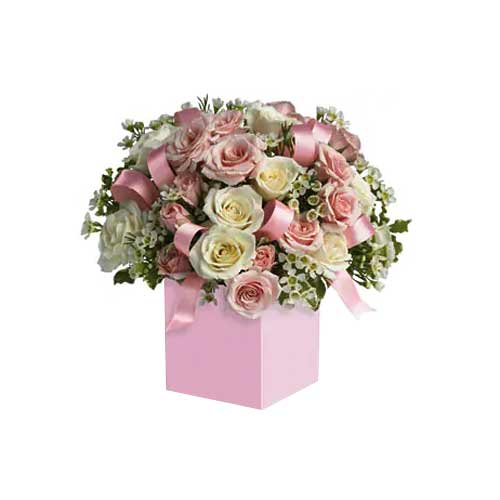 Presented in a box of vibrant flowers including pi......  to flowers_delivery_qutuf_uae.asp